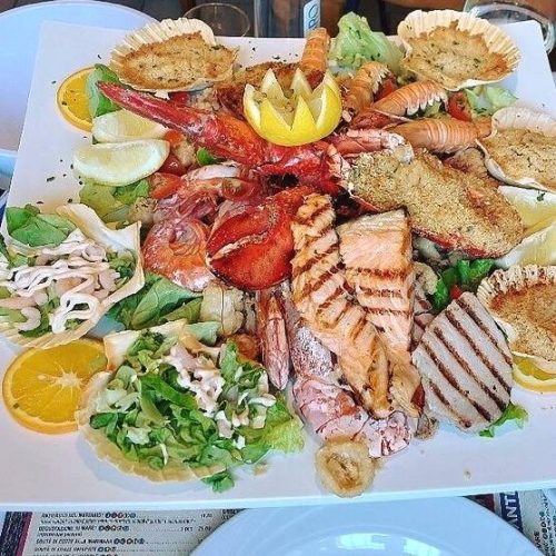 Ristorante con specialità di pesce a Isera